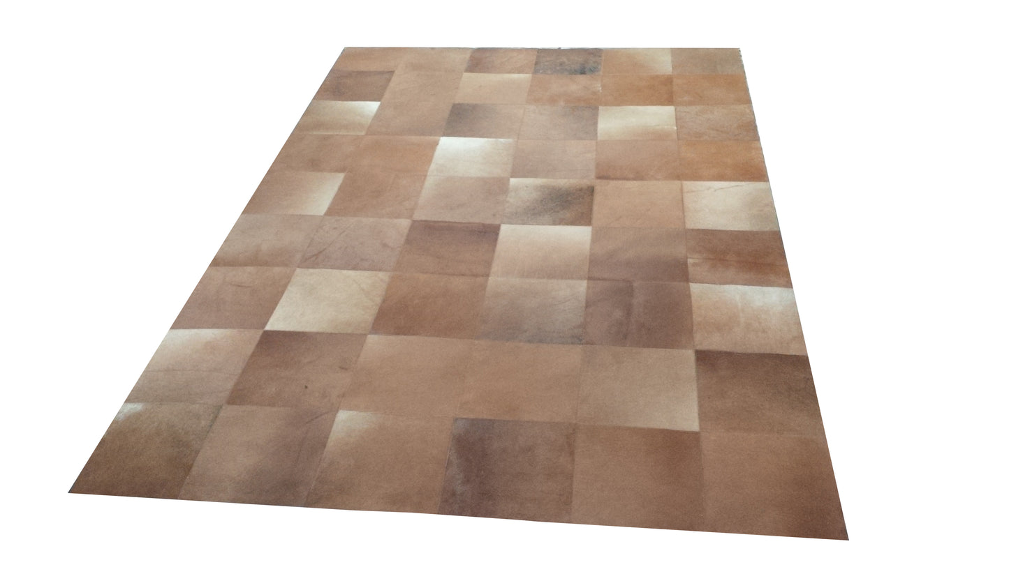 Brown cowhide patchwork rug