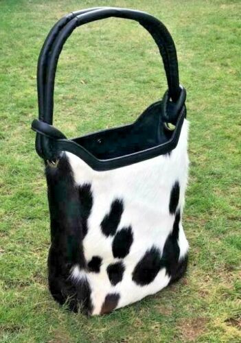 If you are wondering if you should buy this cowhide purse, pull the trigger and buy the purse and you won't regret it.