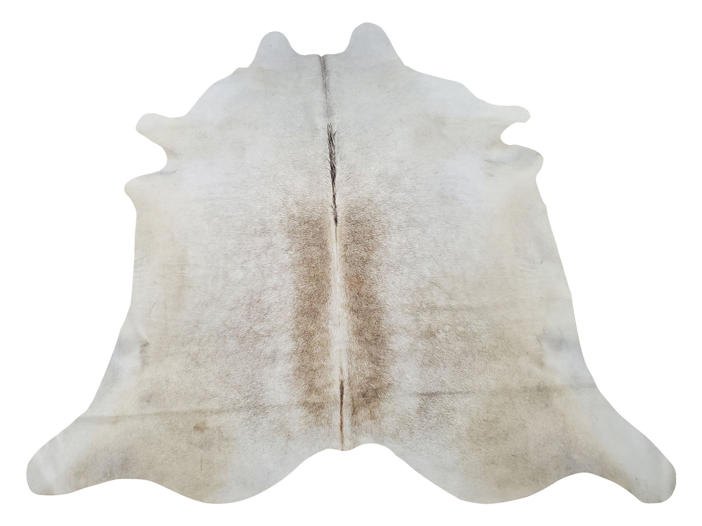 A grey cowhide rug in a library or entryway works perfectly fine, add a nice butterfly chair and it will be a magical space.