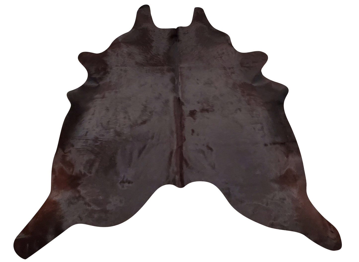 Burgundy cowhide rugs in an open floor have a great delight to any space, high roofs and fewer walls with a lot of natural sunlight will do the magic.