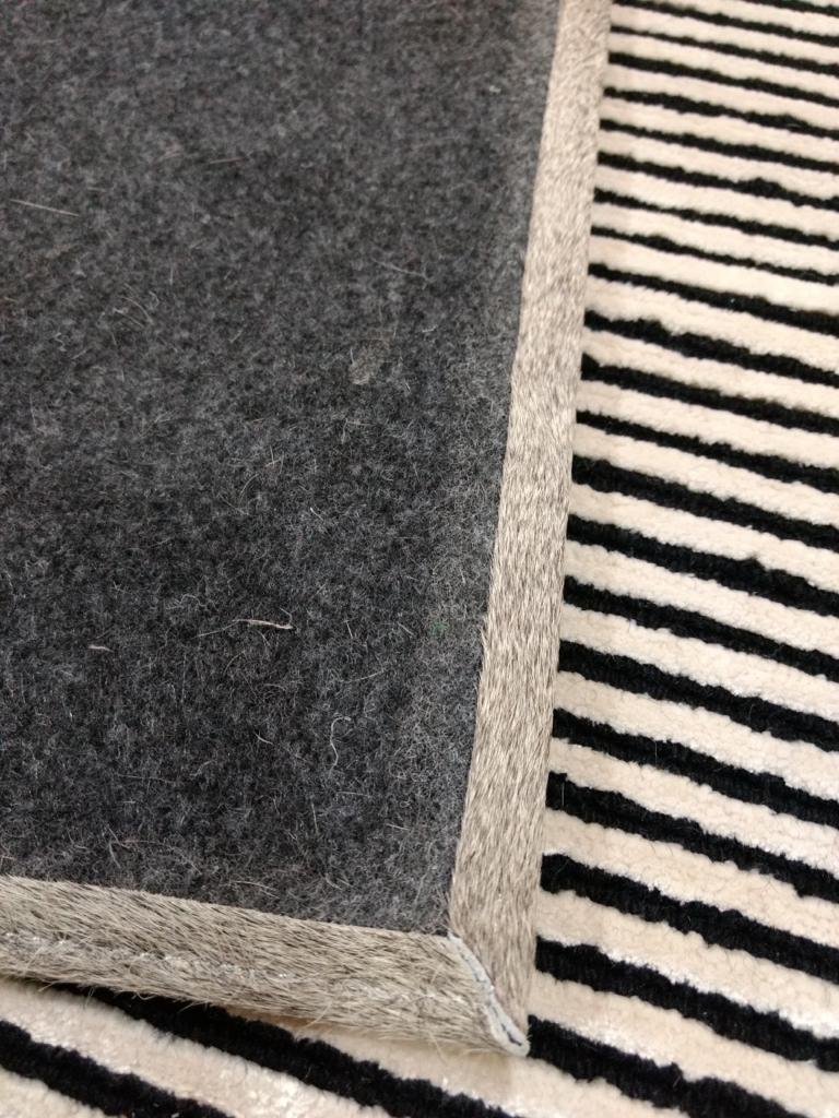 Brown cowhide patchwork rug