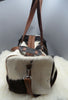 Cowhide duffel bag for travel to the Islands with you and it will hold up well, it will receive many lovely comments.Timely delivery and nicely packaged.