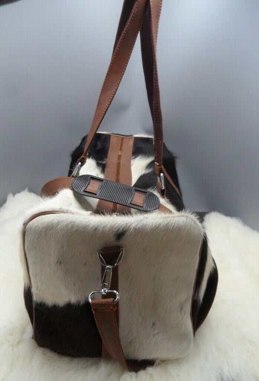 Cowhide duffel bag for travel to the Islands with you and it will hold up well, it will receive many lovely comments.Timely delivery and nicely packaged.
