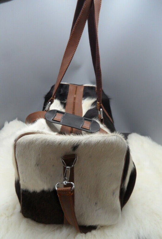 Cowhide duffel bag for travel to the Islands with you and it will hold up well, it will receive many lovely comments.Timely delivery and nicely packaged. 