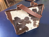 You can select the cowhide you like and we will give it a perfect touch of cowhide purses