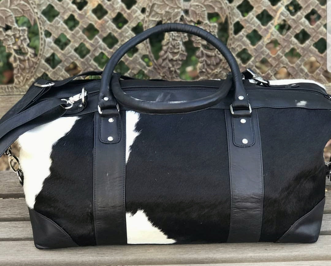 cowhide luggage sets