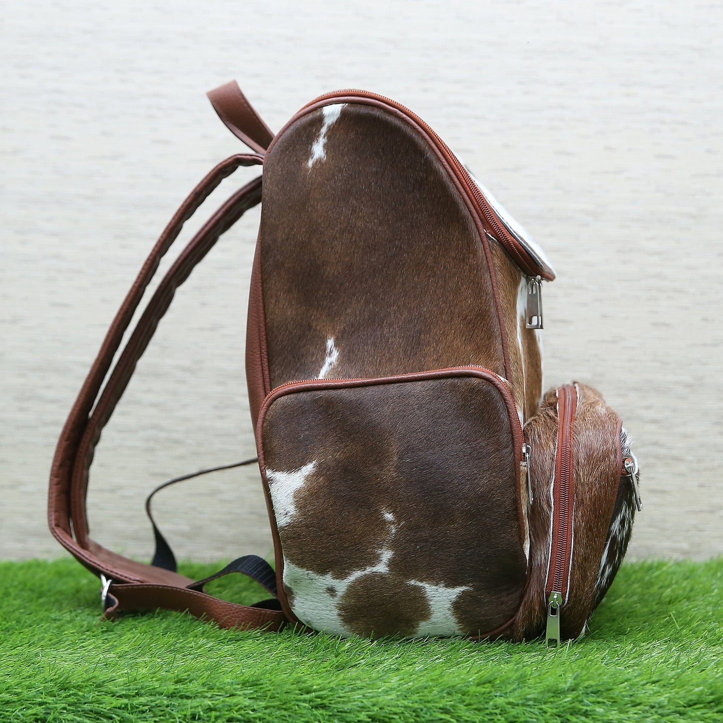 When it comes to finding the perfect backpack, if you're looking for a stylish, custom-made backpack that will turn heads, then you need a real cowhide.