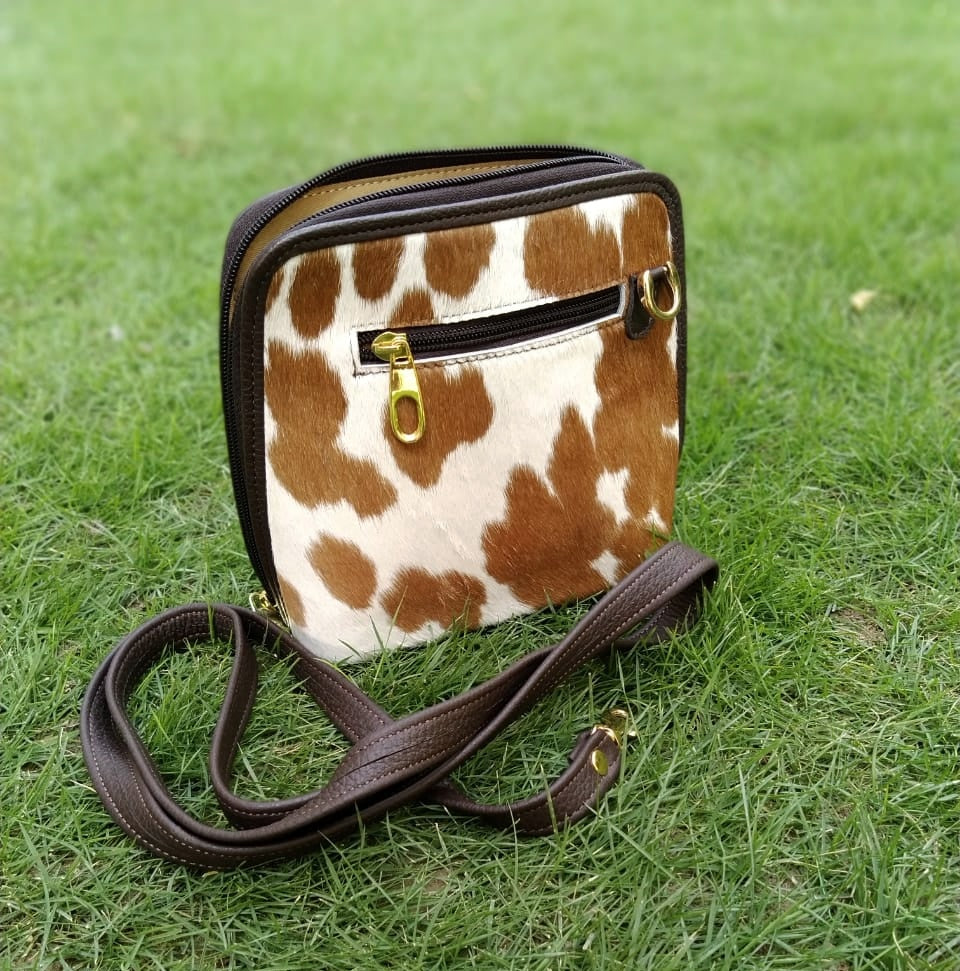 calf hair crossbody bag with fringe in spotted brown white
