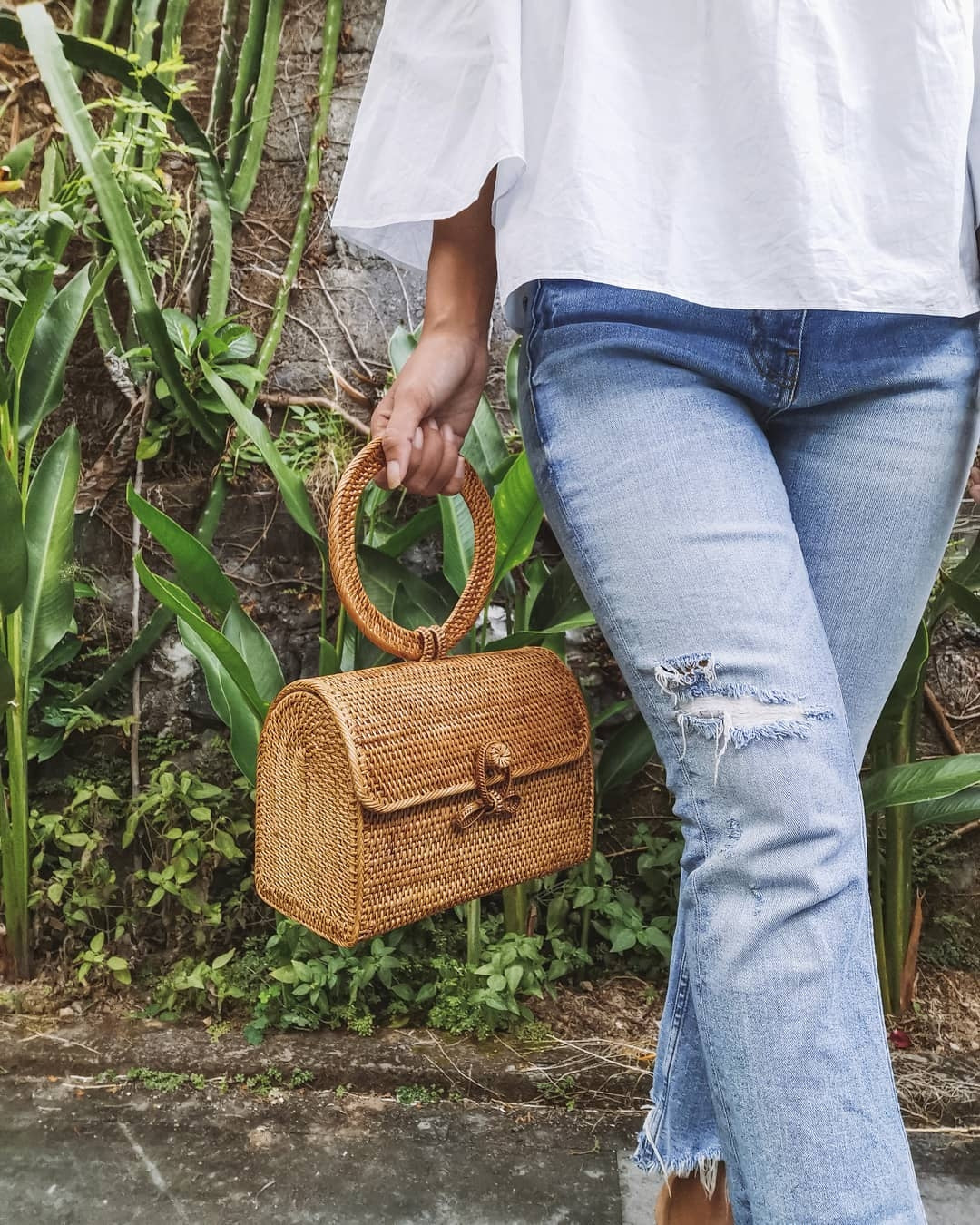 woven rattan clutch bag street level