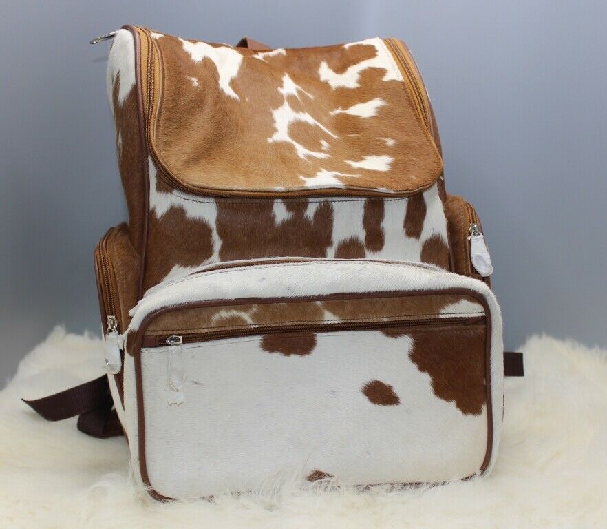 It takes us approx seven business days to make this cowhide bag a brown backpack is perfect for your school trip or for mommies to go shopping.