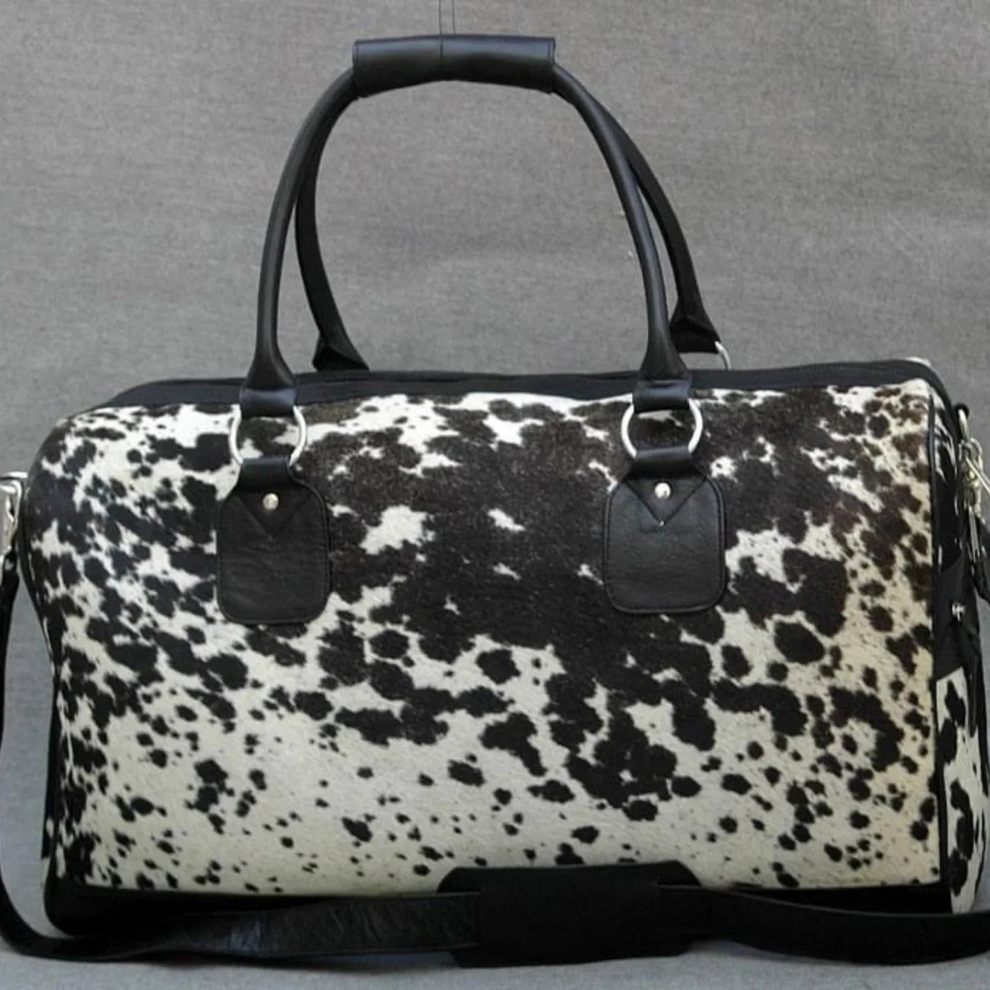 Cowhide duffle bag black white travel leather