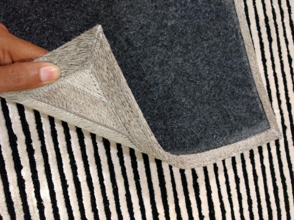 Brown cowhide patchwork rug