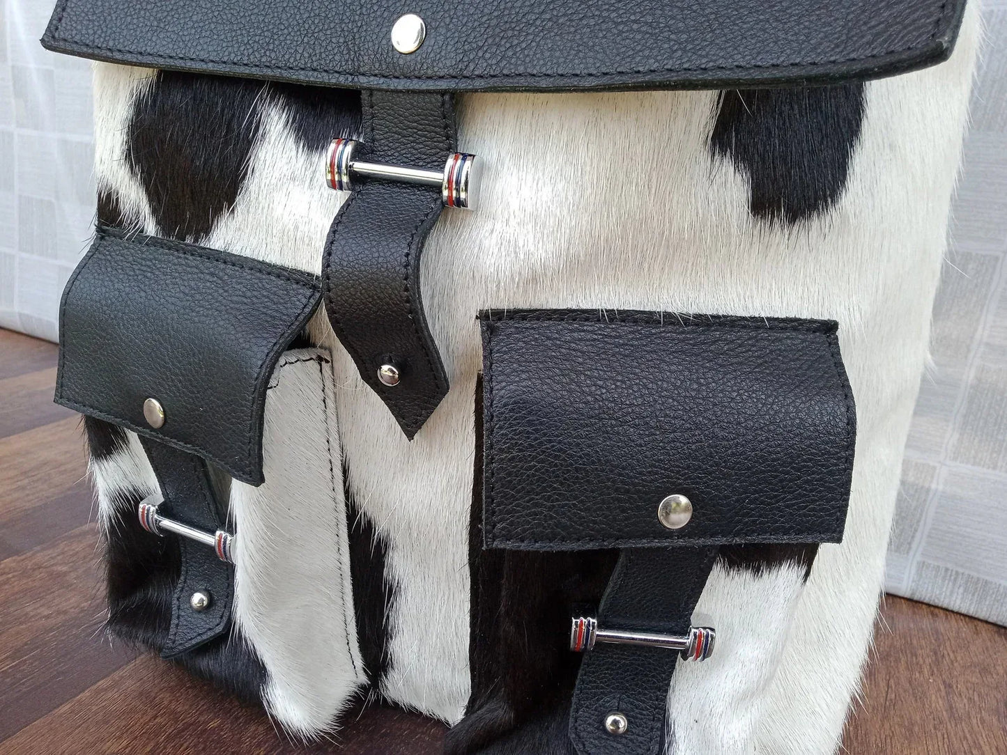 Black leather cowhide backpack with hair on hide