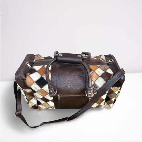 Cowhide luggage bag can accommodate well your belongings and essentials safely. Equipped with detachable shoulder strap which is adjustable.