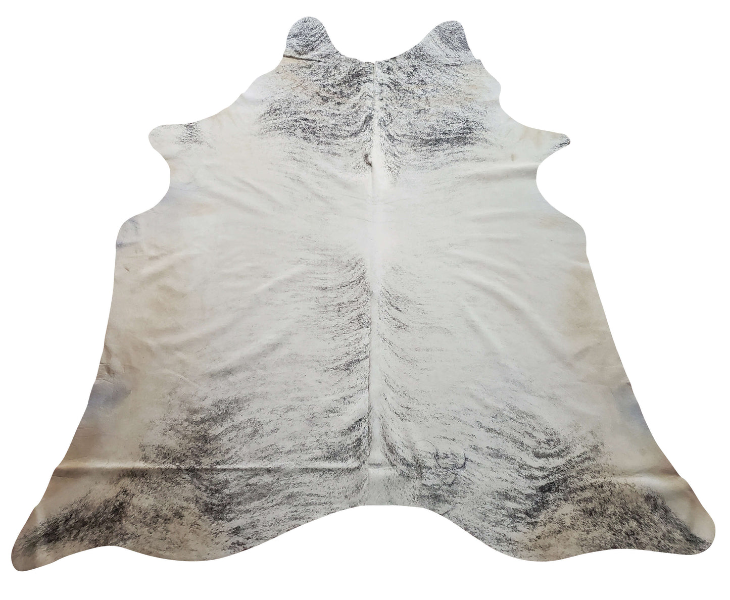 A grey brindle cowhide area rug can greatly enhance your living room, providing beauty with a touch of western style.