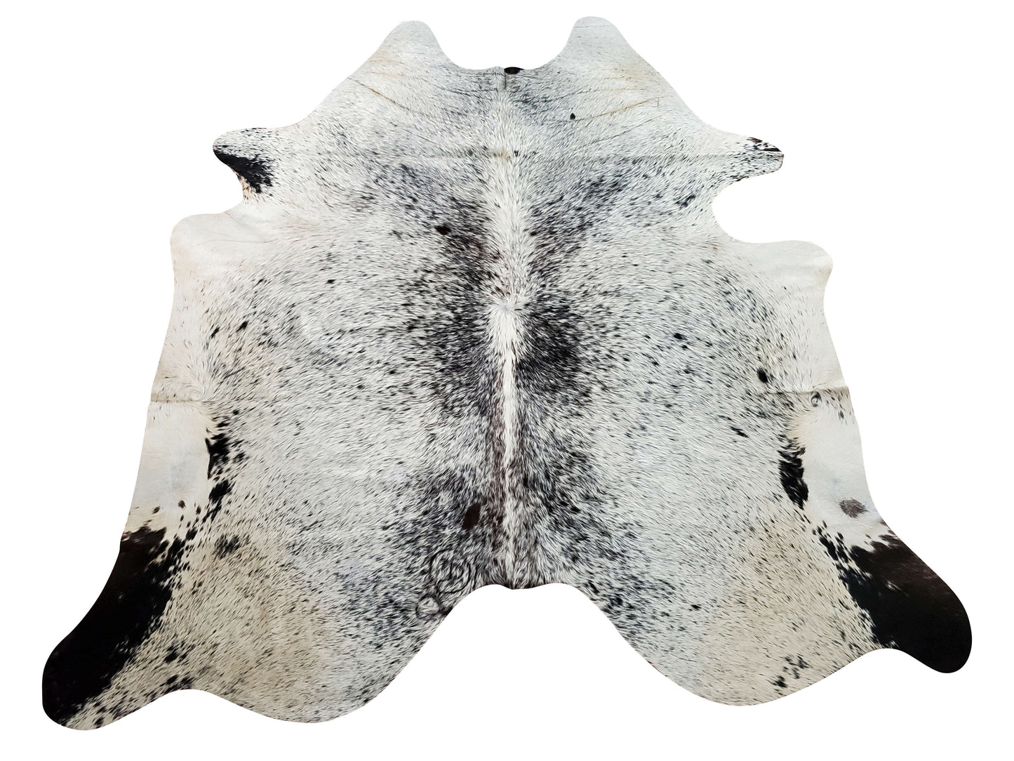 A trendy speckled cowhide rug in black and white colors to match nearly any living room or kitchen, it is an excellent addition to any house. It's of good quality and looks great.