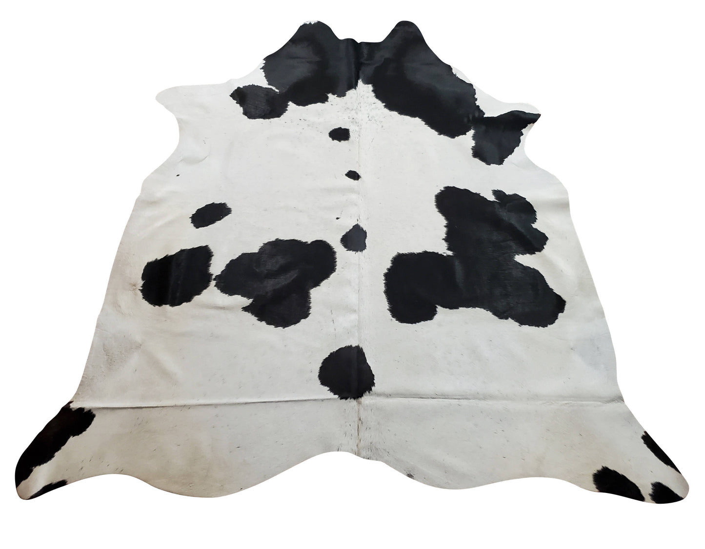 This black and white cowhide rug will look beautiful in any kind of living room, especially your boho living room.