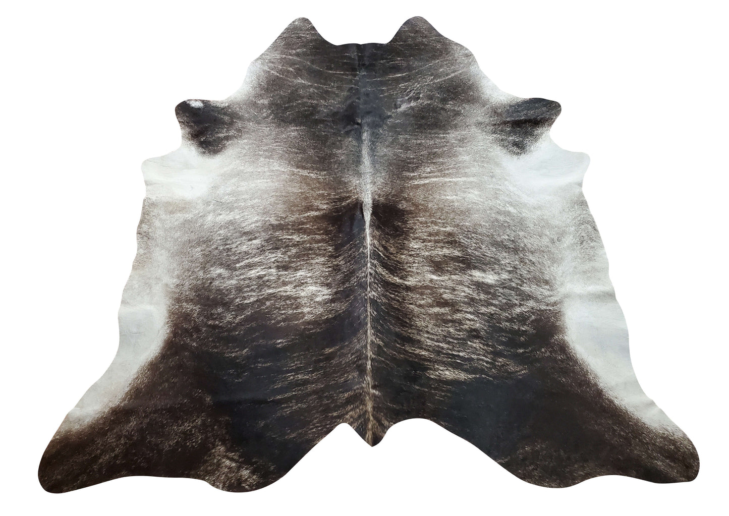 This natural grey brindle cowhide rug will complement any décor, and the large size makes it perfect for any room in your home.