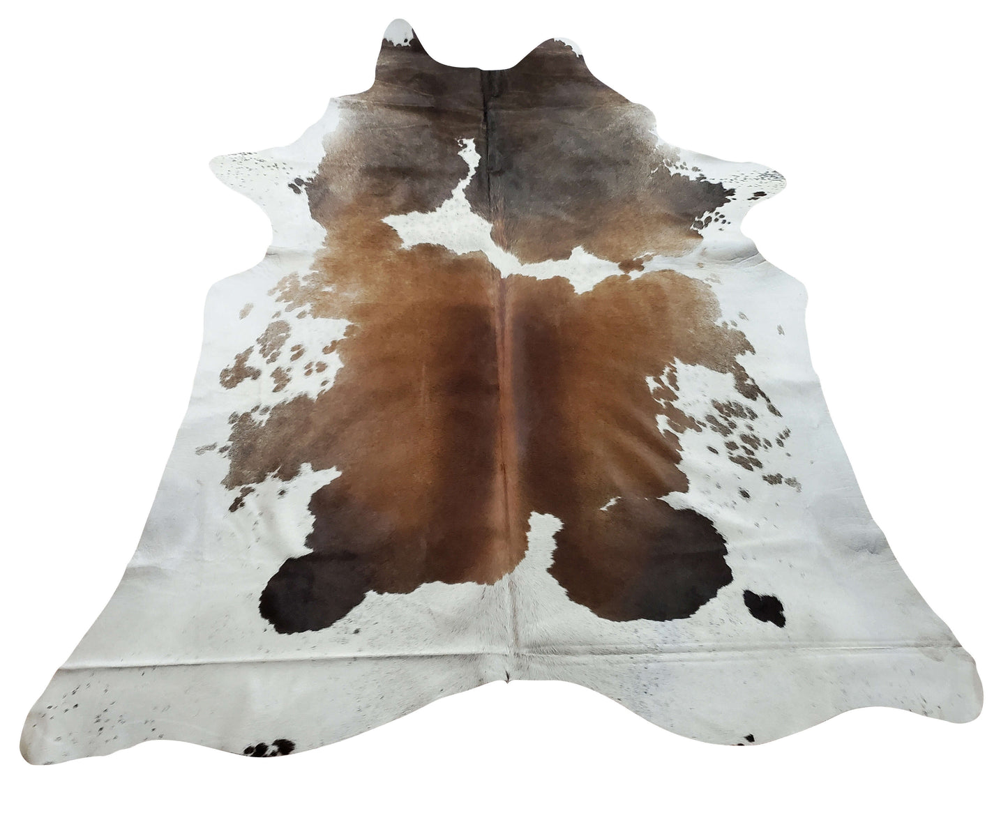 This cowhide rug includes a suede backing, making it easy to clean. It comes in two neutral colors: brown and black, but you can also choose from white or black trim.