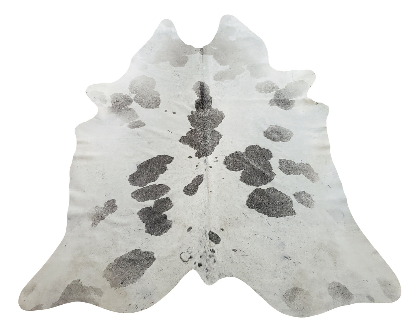 If you can add just one item to your space, a grey white cowhide rug stands the test of time, it's durable, practical, and highly authentic.