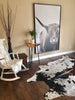 These cowhide rugs are very soft/pliable and not stiff at all which makes these great for upholstery, draped over furniture or even wall decor.