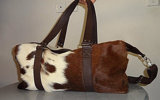 Cowhide luggage bag