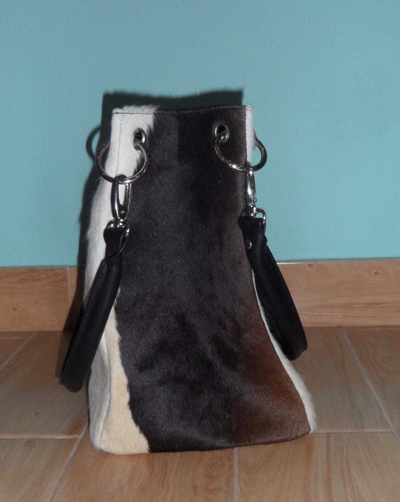 The quality is spectacular and I’m very happy with the time frame it took to finish this cow fur bucket bag