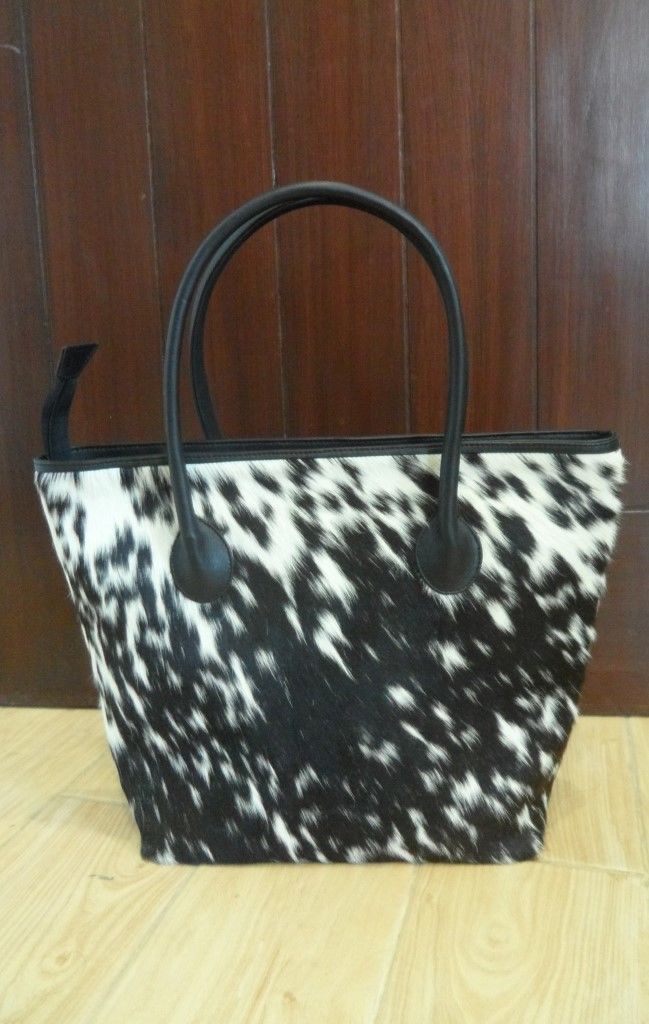 cowhide cross body bag