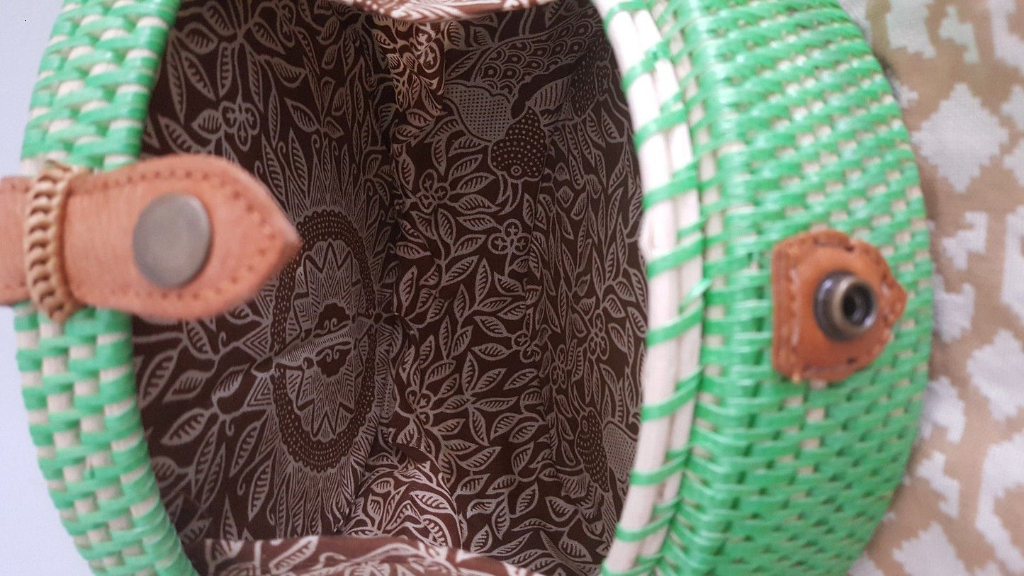 Beautiful Bali bags made from natural rattan with intricate designs.
