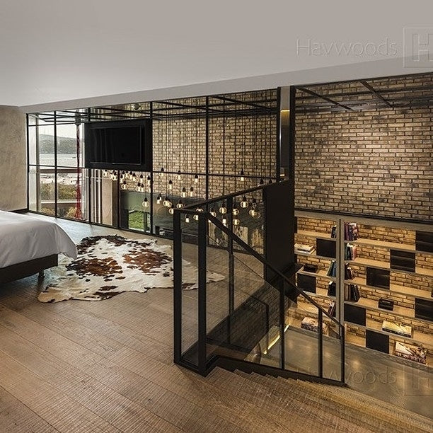 One of its kind beautiful tricolor cowhide rug in this open concept living room. 