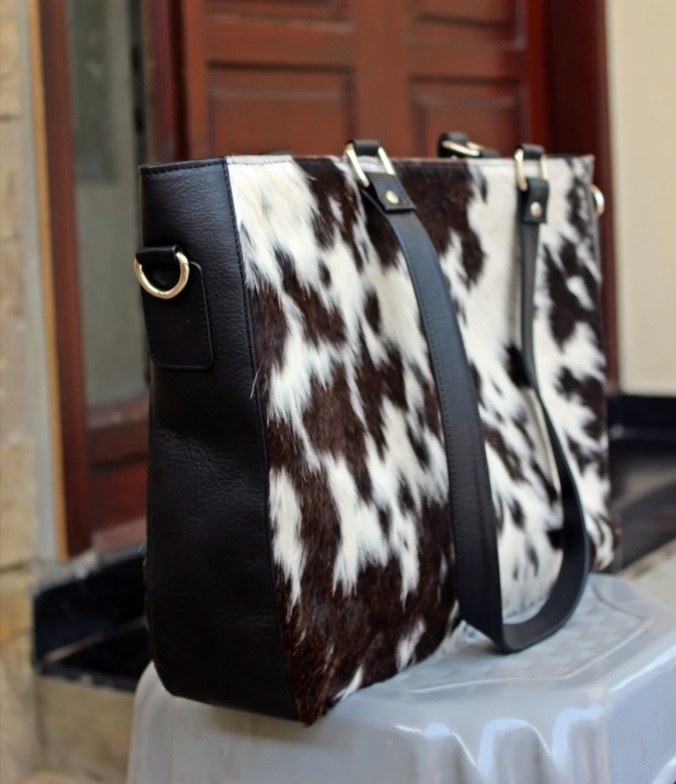 Find a one-of-a-kind cowhide bag with unique patterns and durability. Perfect for daily use or special occasions.