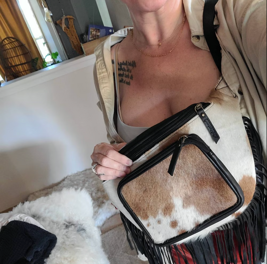 Explore durable cowhide purses with authentic patterns, sturdy construction, and timeless appeal. Choose from handbags, messenger bags, and backpacks.