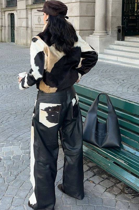 Compare cowhide trench coats with traditional fur coats. Learn about durability, texture, and styling versatility for women.