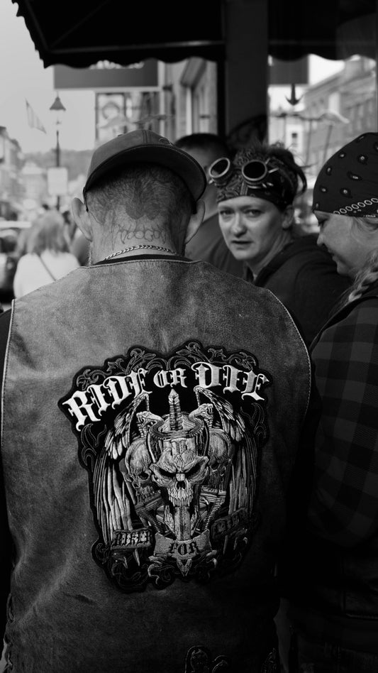 A group of people standing around each other