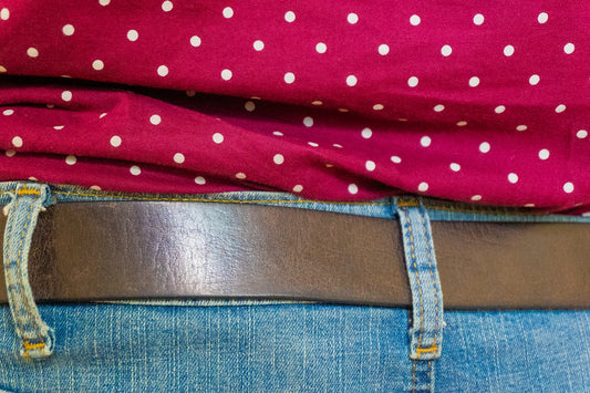 Close-up of a red polka dot shirt and jeans