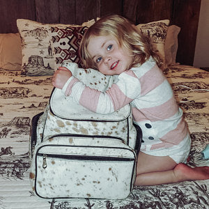 Craft your perfect cowhide backpack with custom designs and details! Perfect for school, events and long travels, our unique backpacks are perfect for any occasion. Get it personalized now!