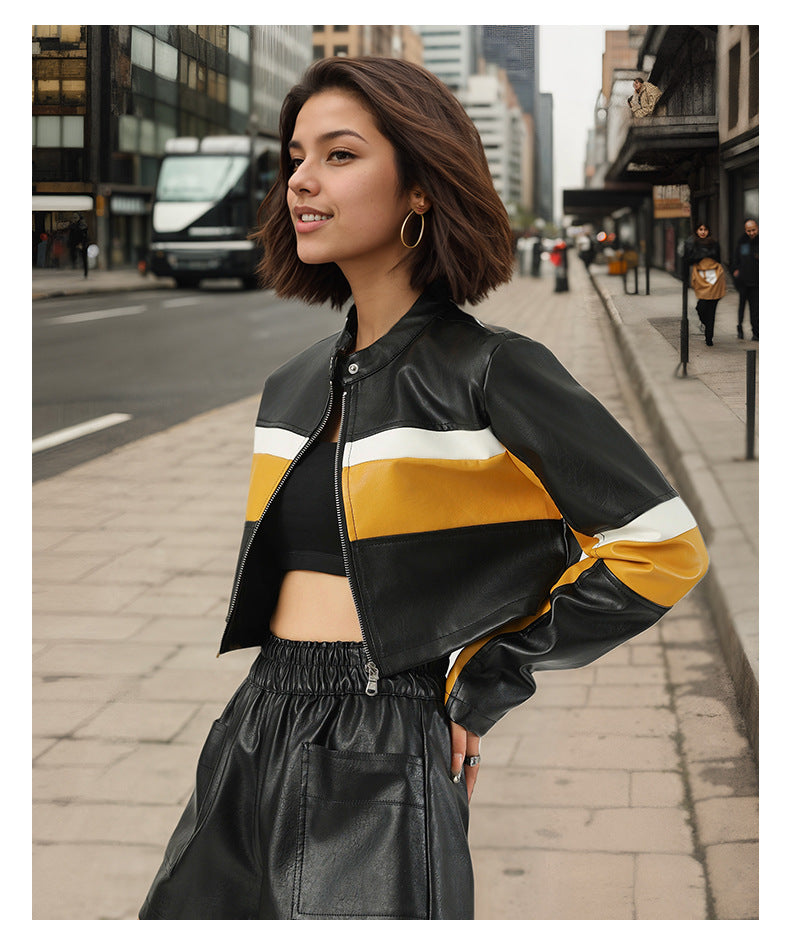 Standout women faux leather jacket in a cropped biker design with PU colorblock panels. A bold fashion layer with zip closure and structured long sleeves.