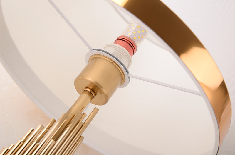 Modern scandinavian brass table lamp with fabric shade