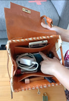 Handwoven rattan shoulder bag with leather
