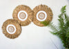 White seagrass beads round wall decor