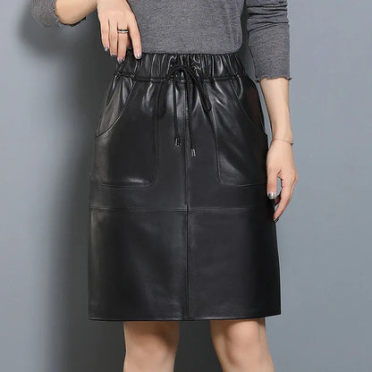 Black elastic waist leather midi skirt with pockets