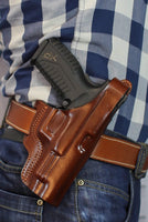 Slim design custom leather gun holster with thumb break