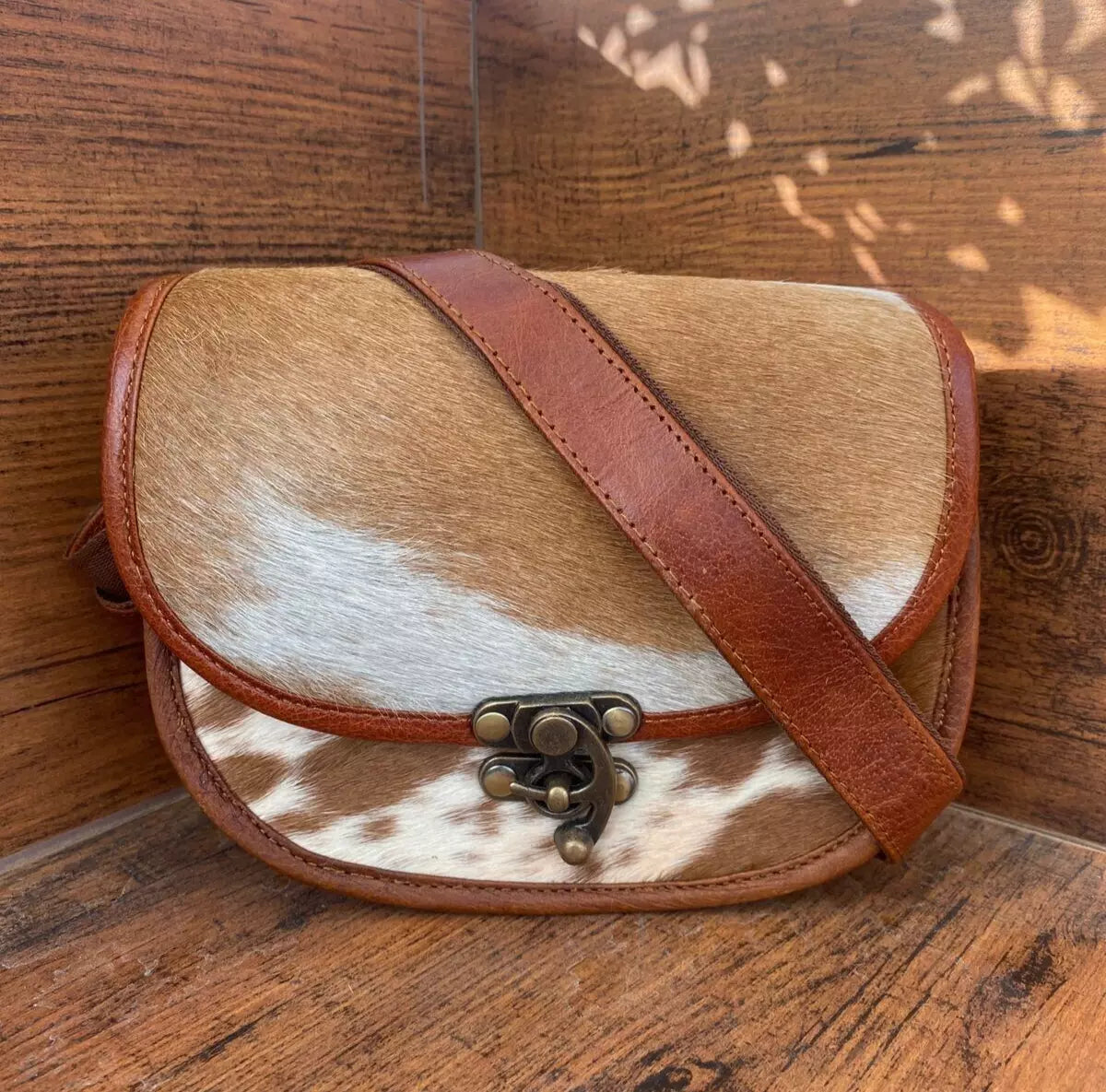 small cowhide fur sling purse