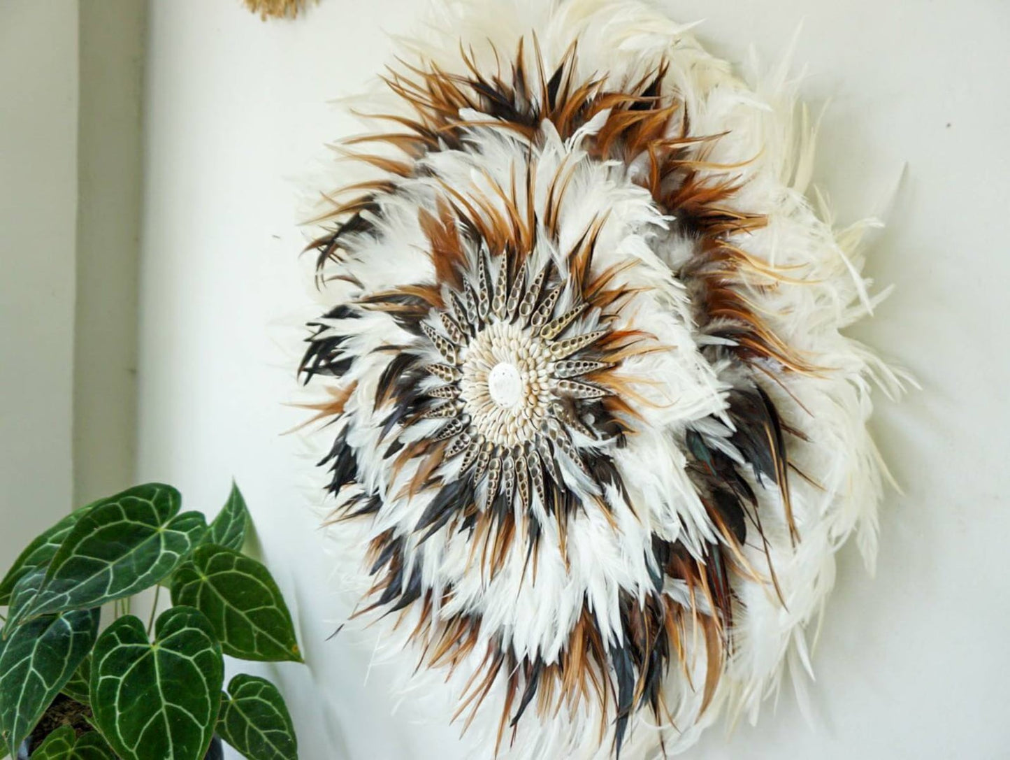 White mixed brown juju hat sea shell wall hanging