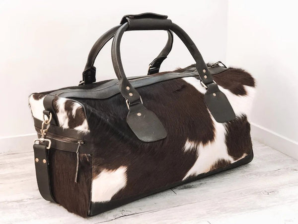 Prepare for your trips with our cowhide overnight bag. Durable, reliable, and spacious enough for all your essentials.