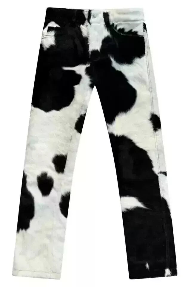 Hair on cow skin trouser with authentic black and white cowhide. These cowhide pants suit country living, cowboy outfits, and bold western fashion looks.