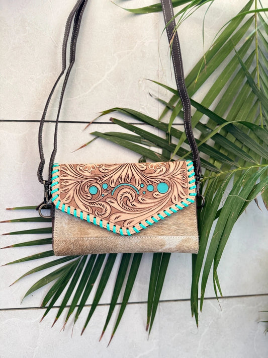 tooled leather hair on hide crossbody handbag