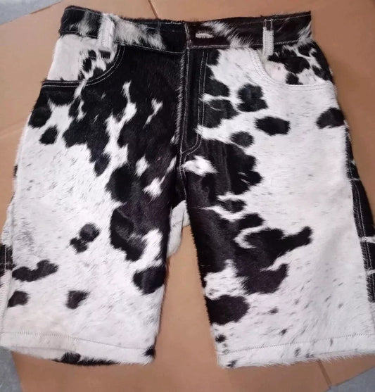 Shop real cowhide shorts for men in black, brown, and white. Hair-on leather with natural texture, high waist, and structured hem design.

