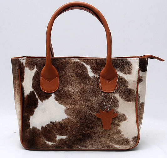 Carry a piece of nature with you with our natural cowhide tote bag. 