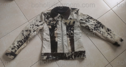 Make a bold impression with this handcrafted cowhide jacket. Featuring real cow skin hair-on-hide finish, it’s ideal for rodeo events, ranch days, and country weddings.


